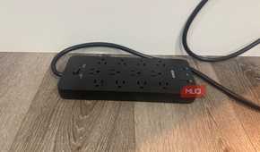anker power strip plugged in on floor