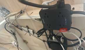 Anker surge protector under desk