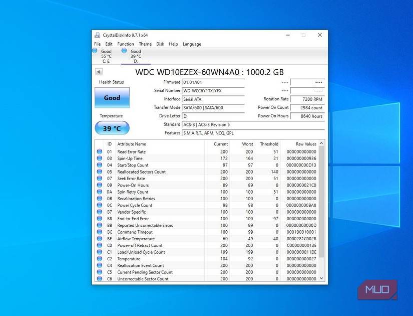 CrystalDiskInfo window with S.MA.R.T. attributes visible