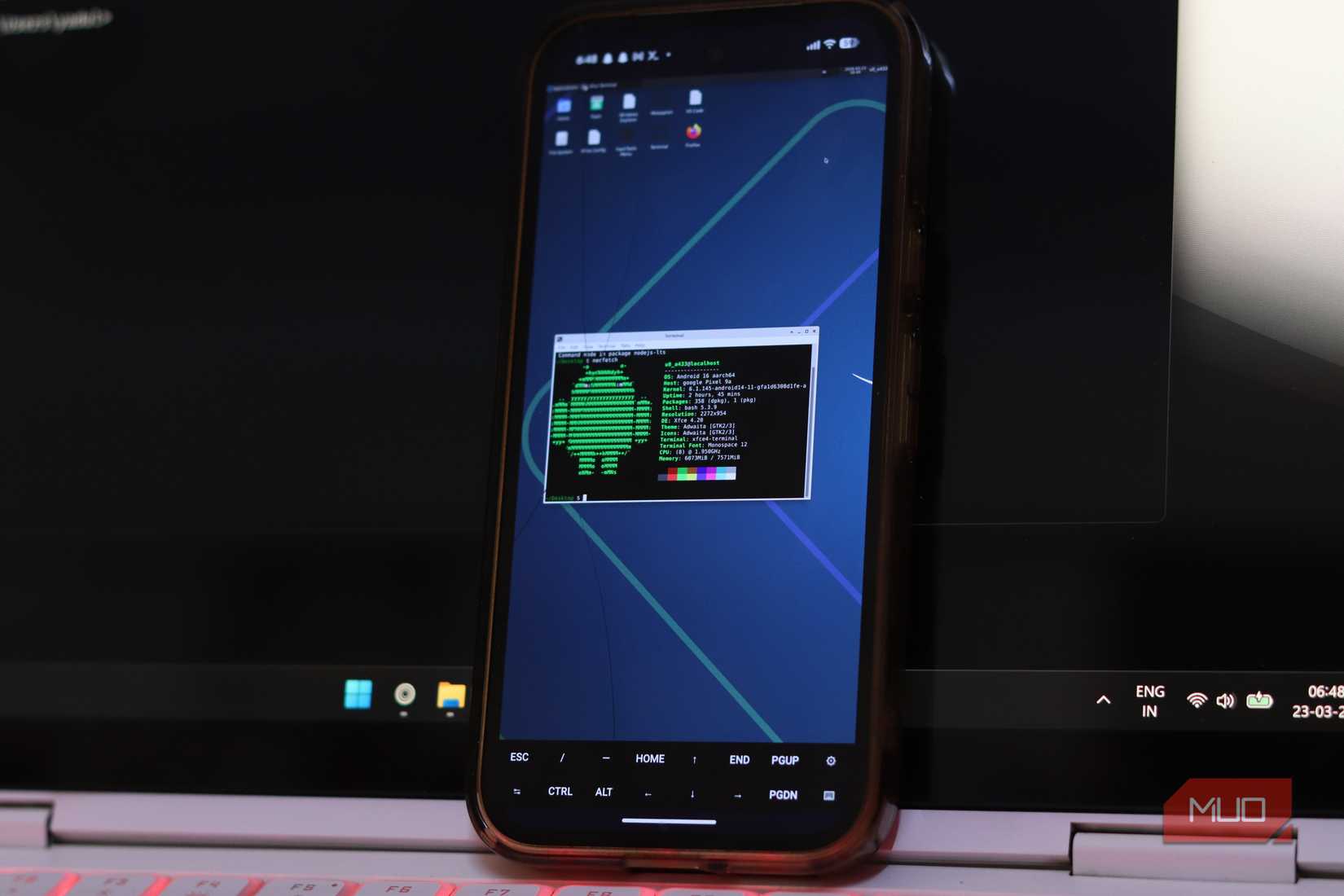 Desktop Linux running with terminal running on Pixel 9a.