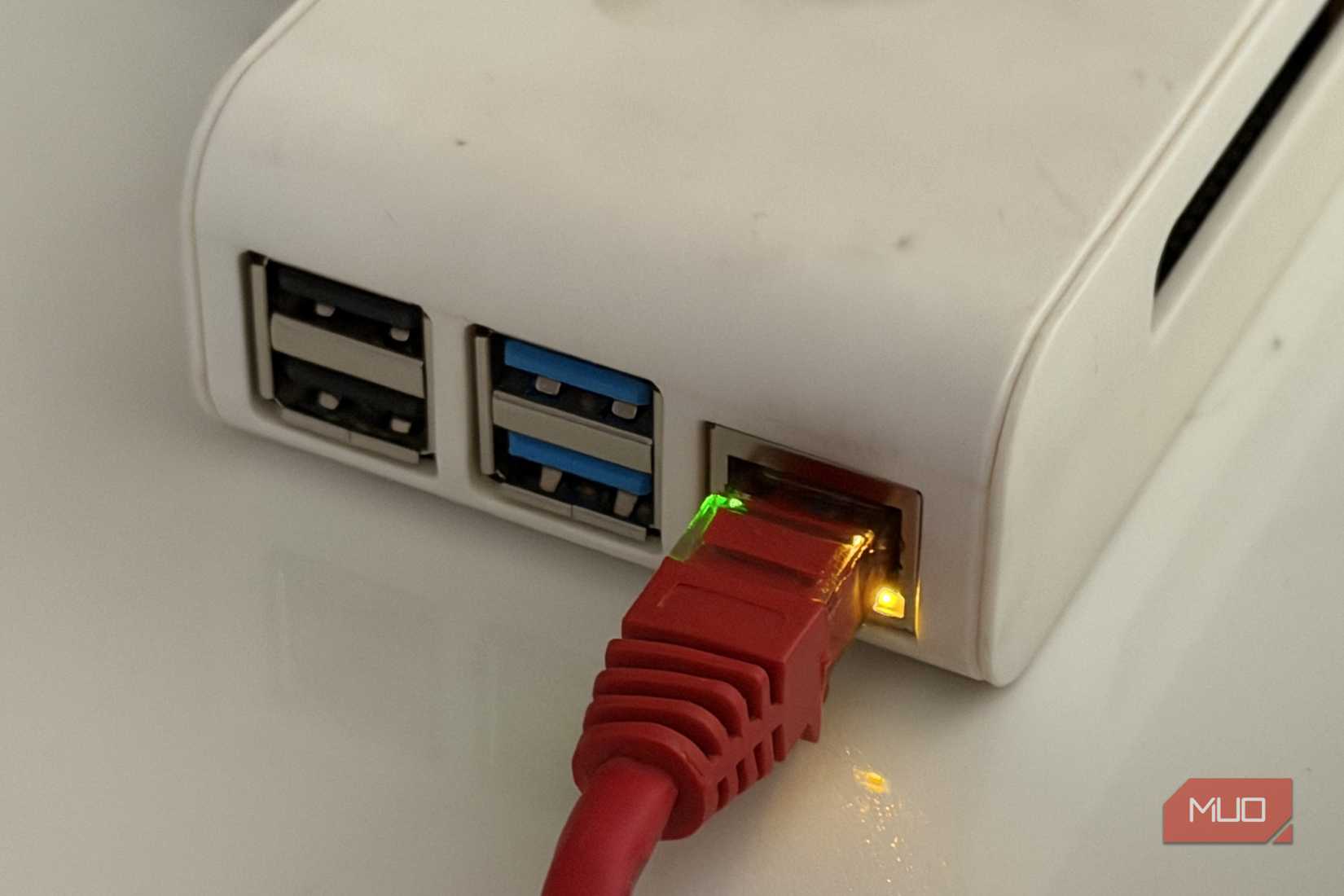 Ethernet and USB ports on a Raspberry Pi with casing