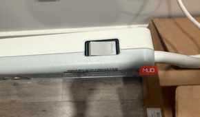 GE surge protector button