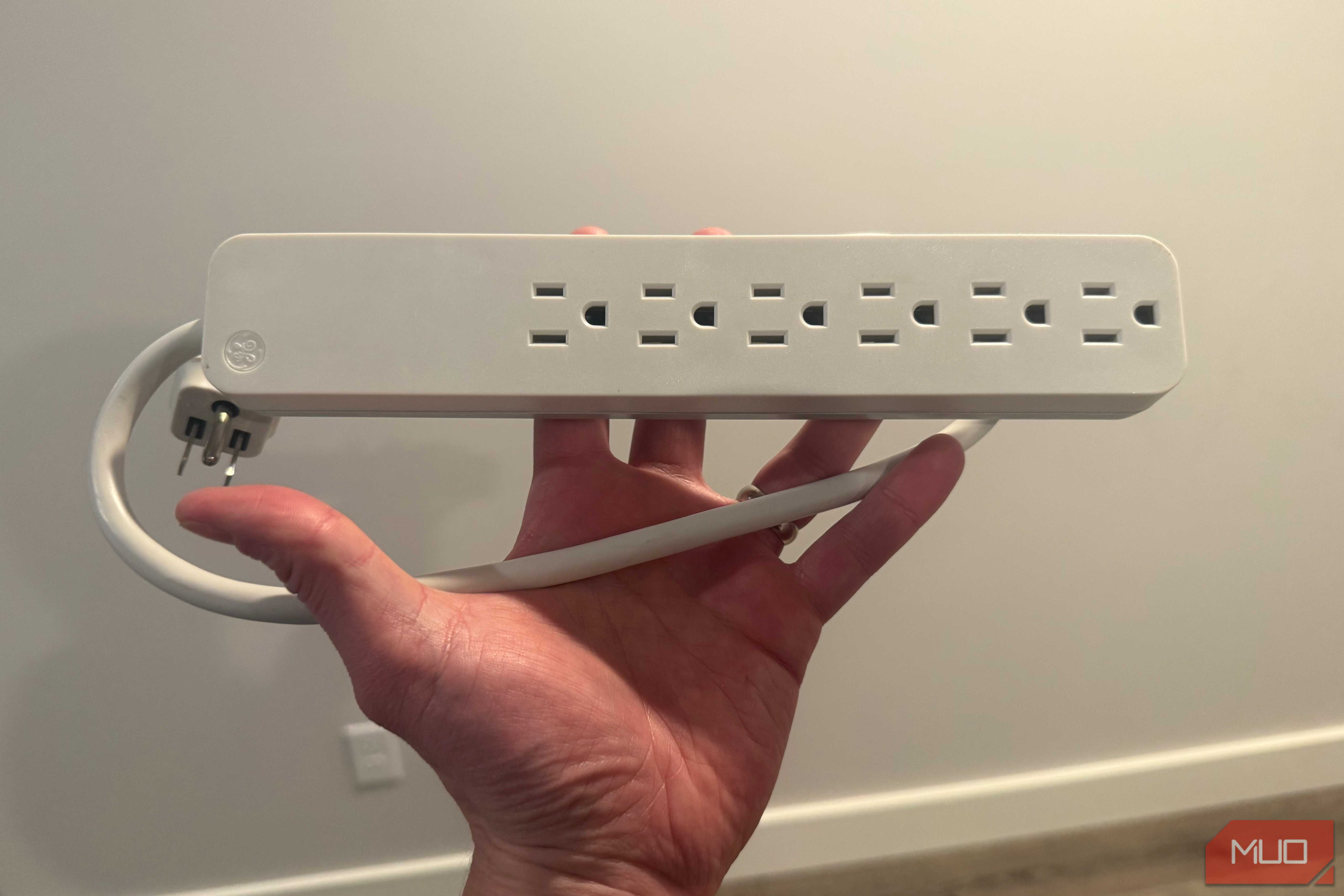 GE surge protector in hand