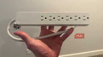 GE surge protector in hand