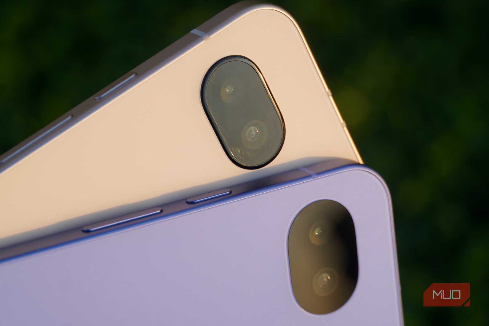 A close up of the Pixel 9a camera bump (top) and the Pixel 10a camera cover (bottom).