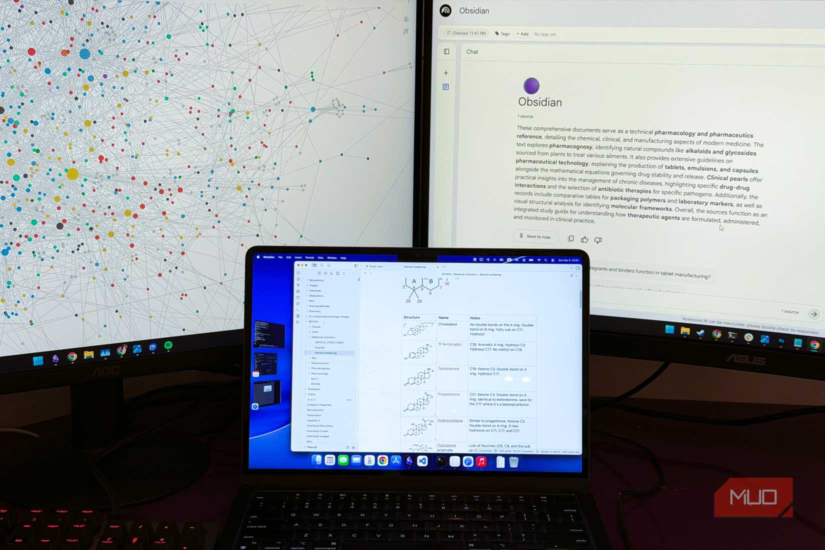 Two monitors and a laptop showing NotebookLM and Obsidian