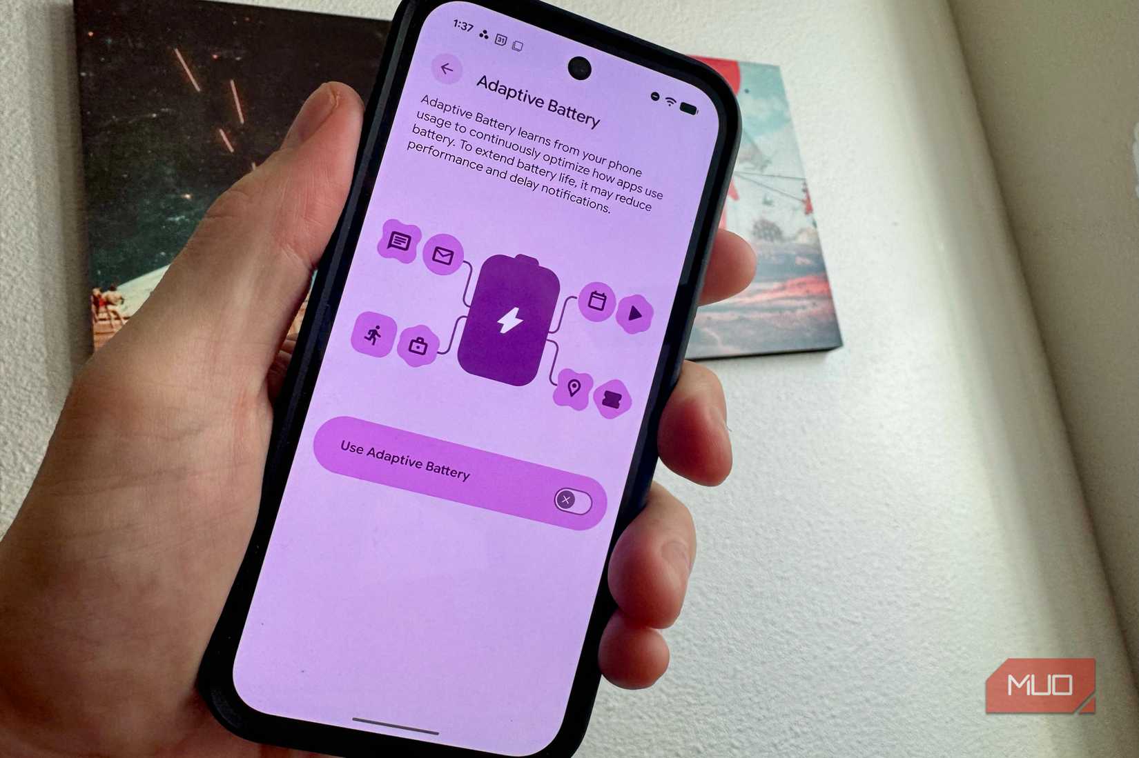 Adaptive battery settings on a Pixel held in a hand