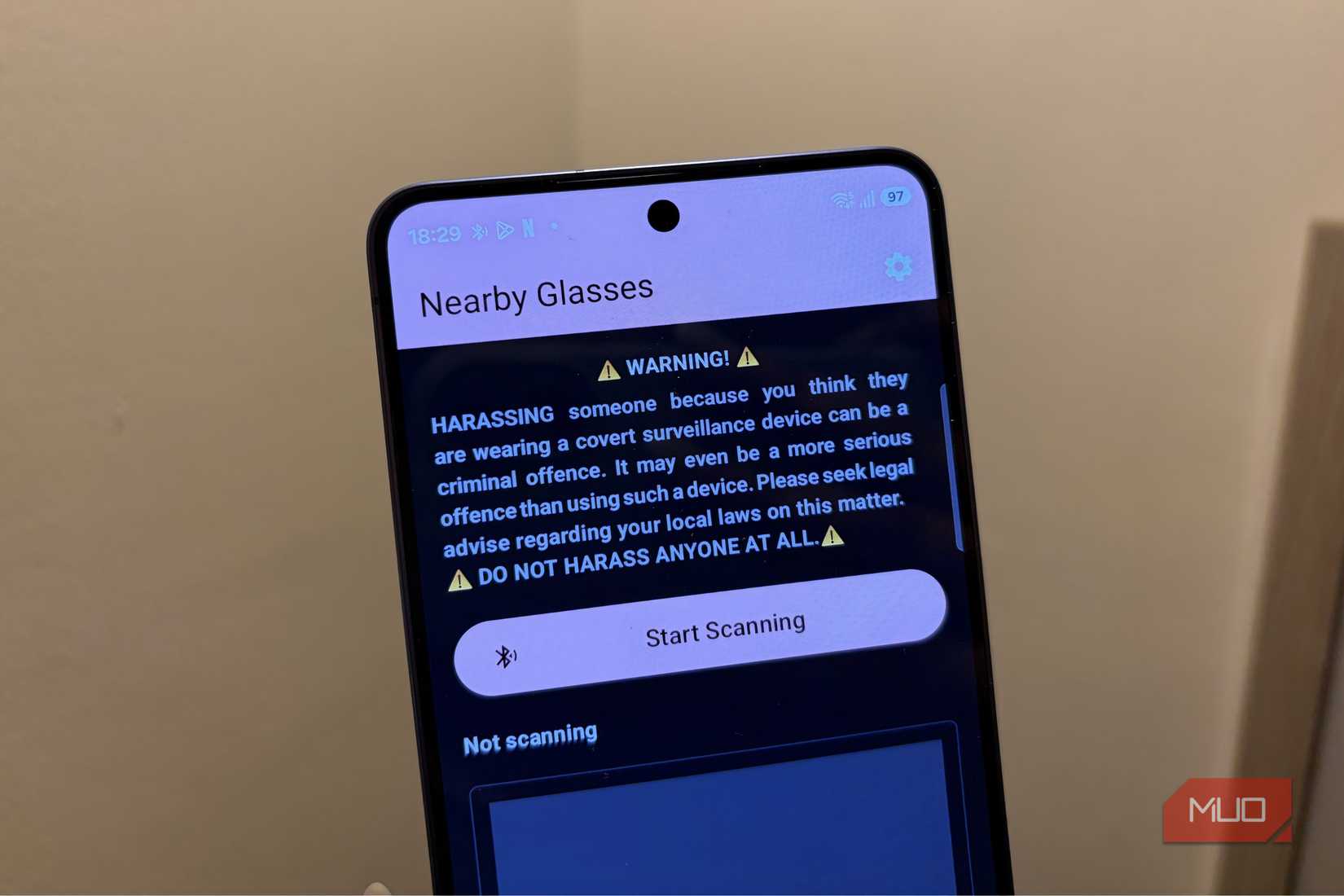 Start scanning the nearby glass button.