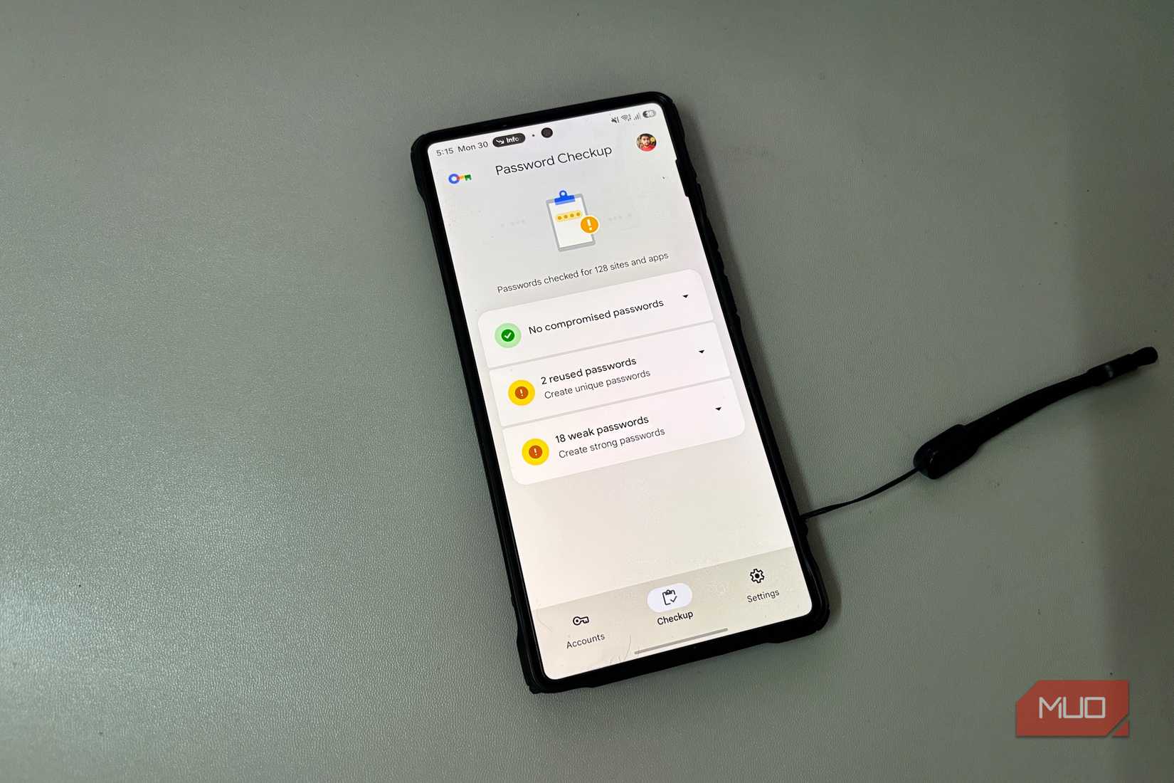 Password Checkup screen with weak and reused alerts