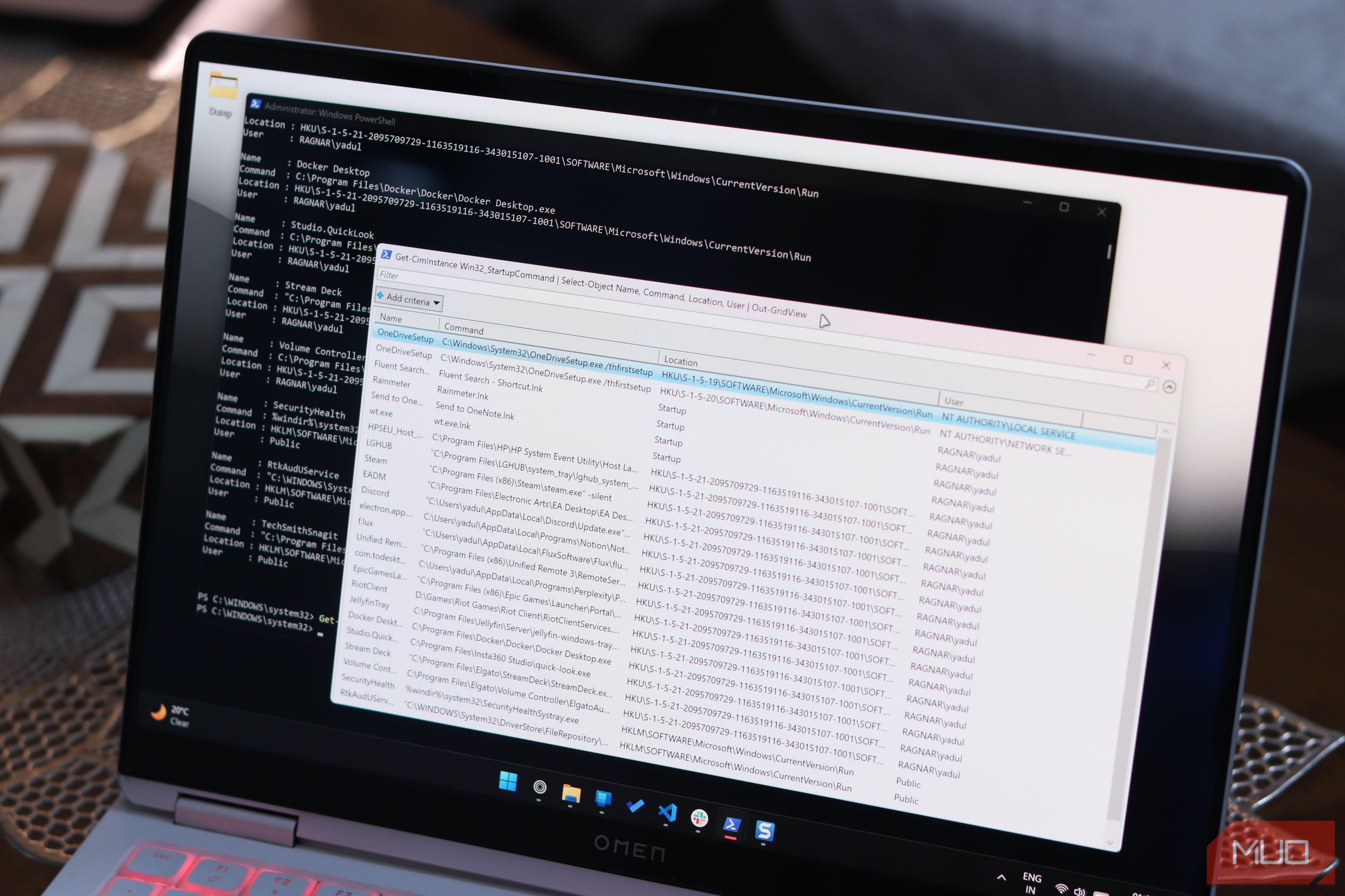 PowerShell terminal and startup apps list open on Windows 11.