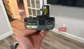 ryobi 18v lithium power tool batter in hand