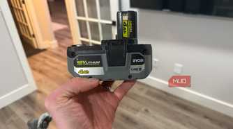 ryobi 18v lithium power tool batter in hand