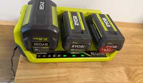 ryobi 40v lithium batteries on a charger