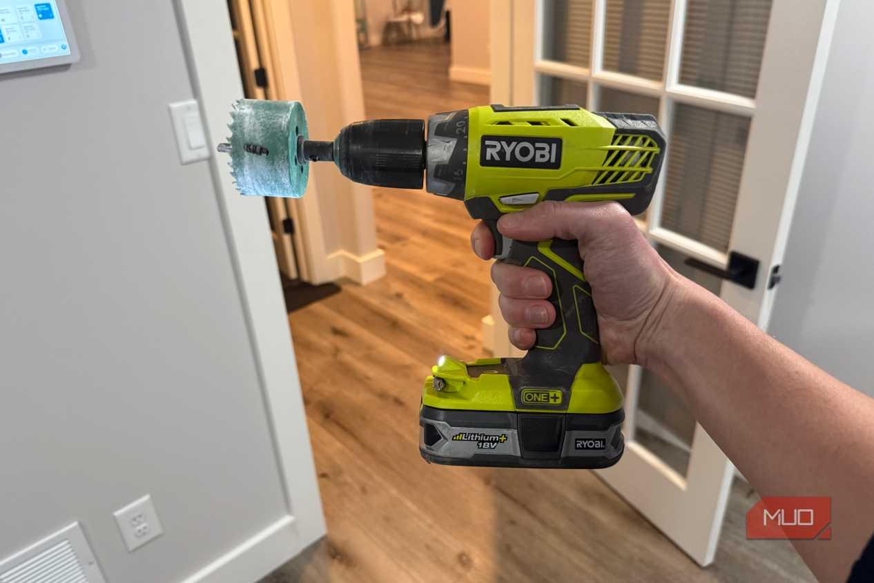 Ryobi drill in hand-1