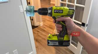 Ryobi drill in hand-1