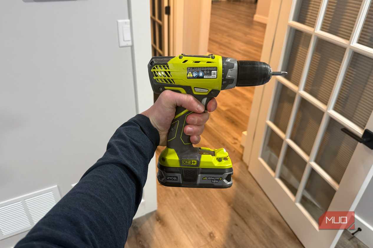 Ryobi drill in hand