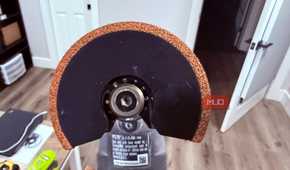 Ryobi oscillating tool with grout blade close
