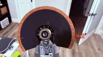 Ryobi oscillating tool with grout blade close