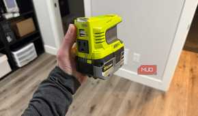ryobi power source in hand with battery