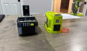 ryobi power source next to battery