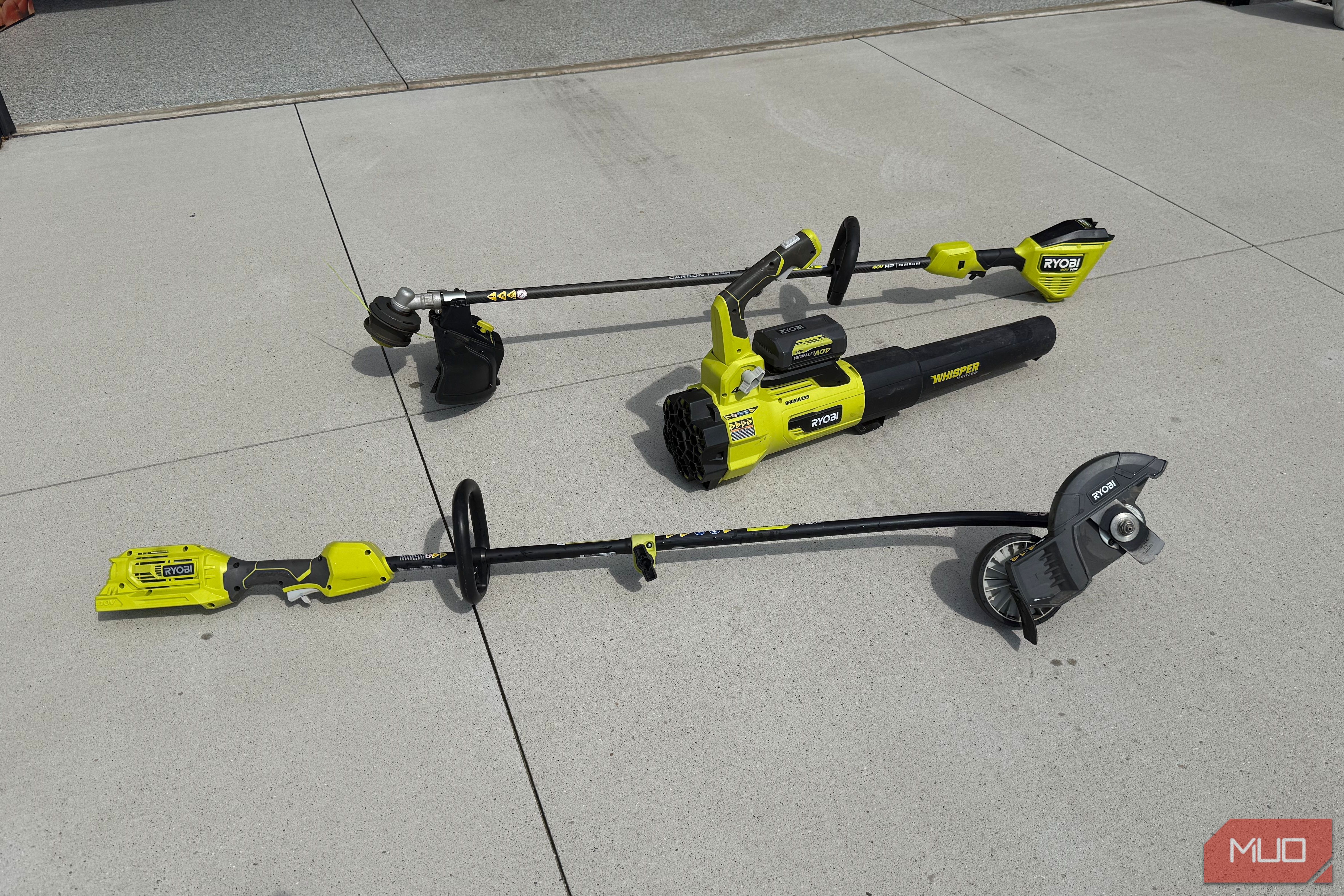 Ryobi yard tools on driveway