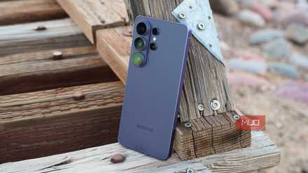 The Samsung Galaxy S26 Ultra leaning up against a railroad track.