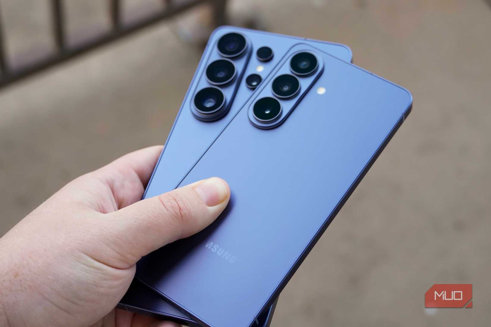 Holding the Galaxy S26 and Galaxy S26 Ultra in the hand.