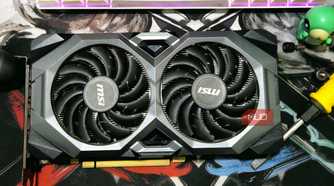 Picture of a GPU sitting on a table.