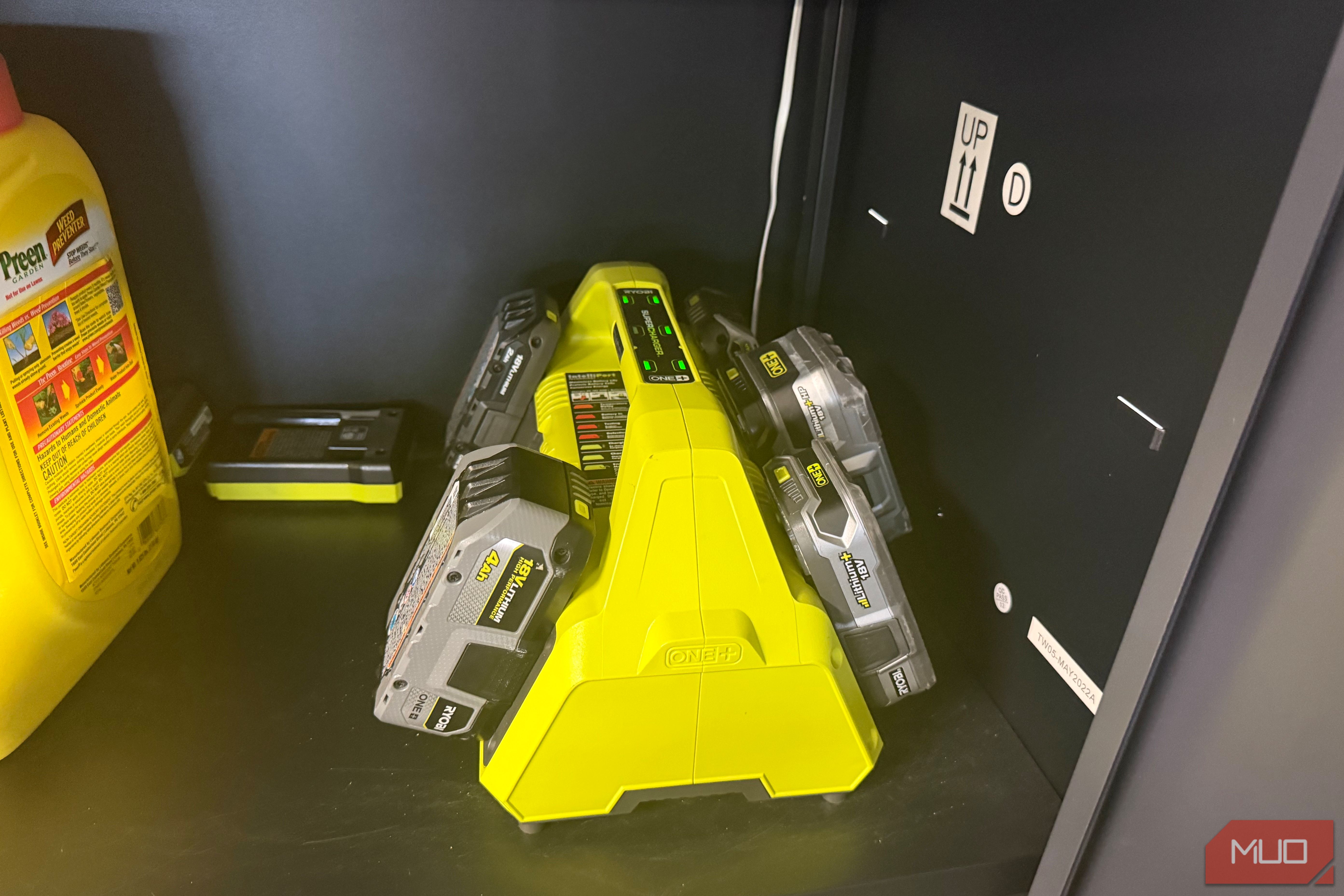 several ryobi 18v lithium batteries on charger