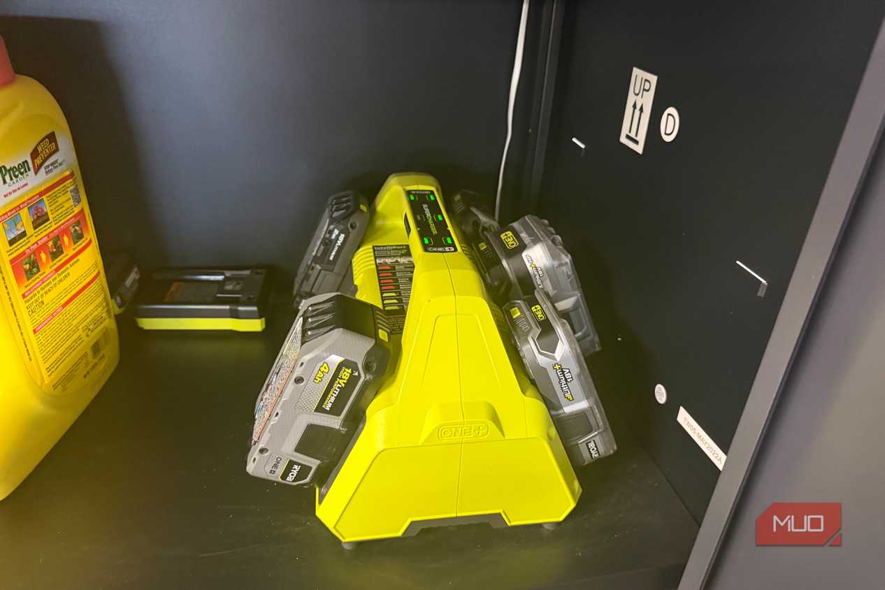 several ryobi 18v lithium batteries on charger