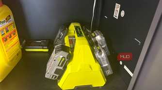 several ryobi 18v lithium batteries on charger