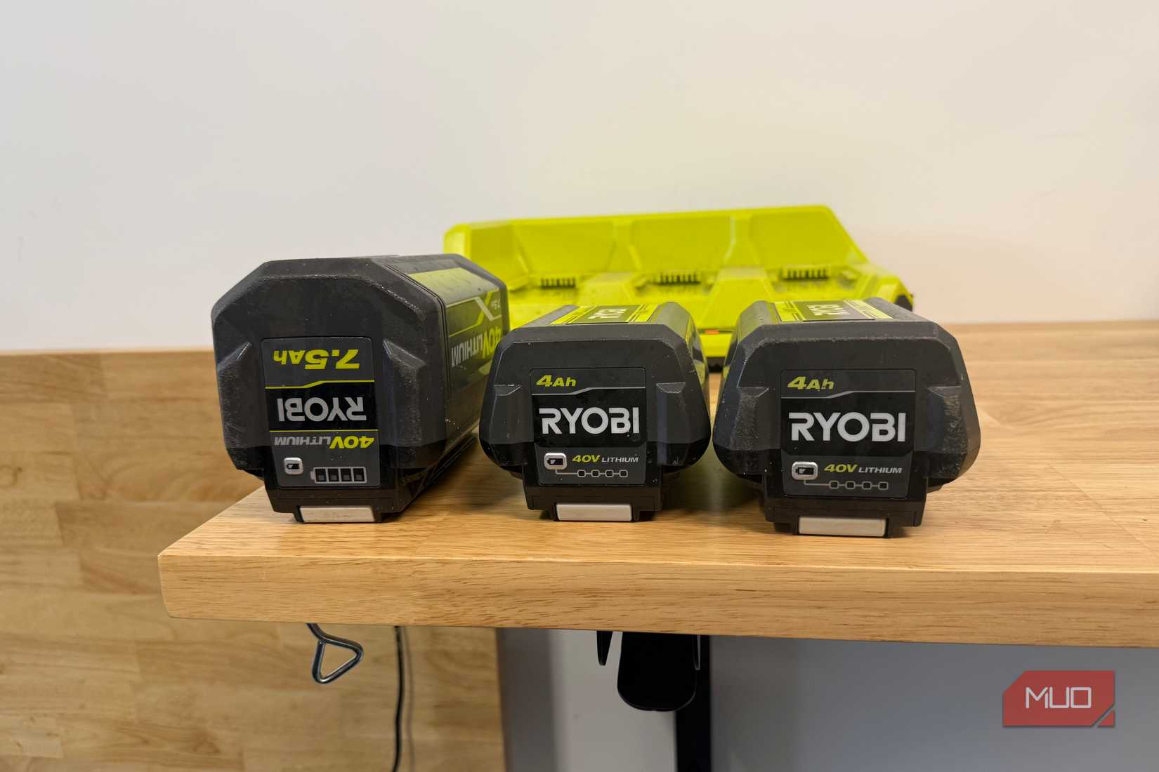 three ryobi 40v lithium on table