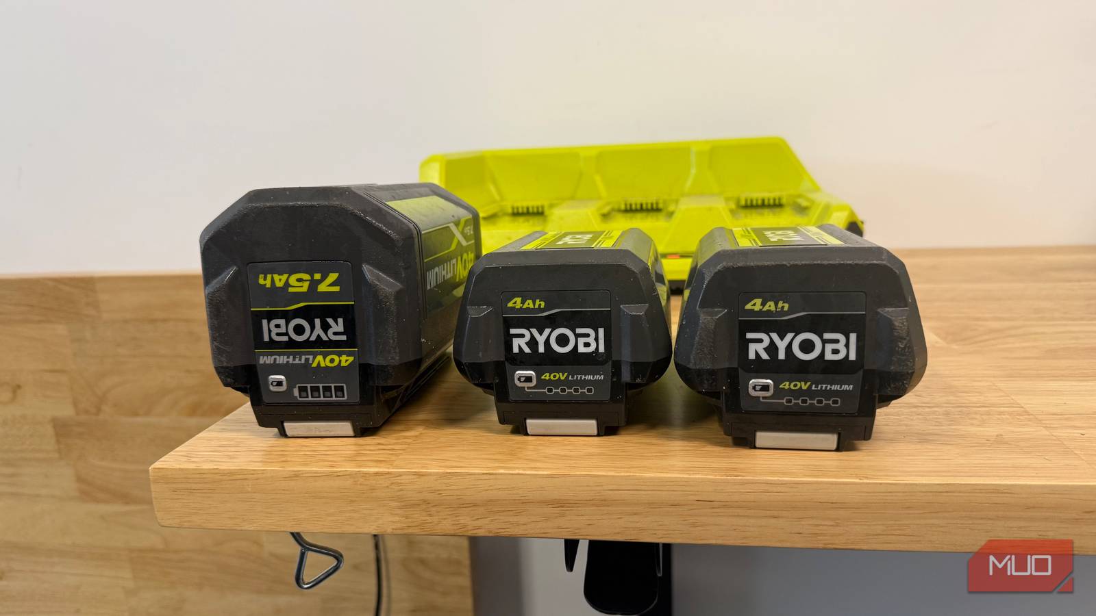 three ryobi 40v lithium on table