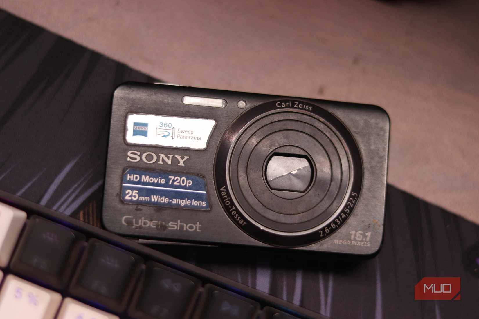 Top view of a sony point and shoot camera on a desk.