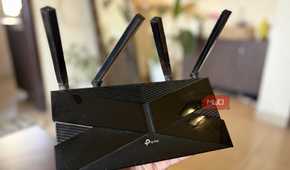 TP-Link Wi-Fi 6 router in hand