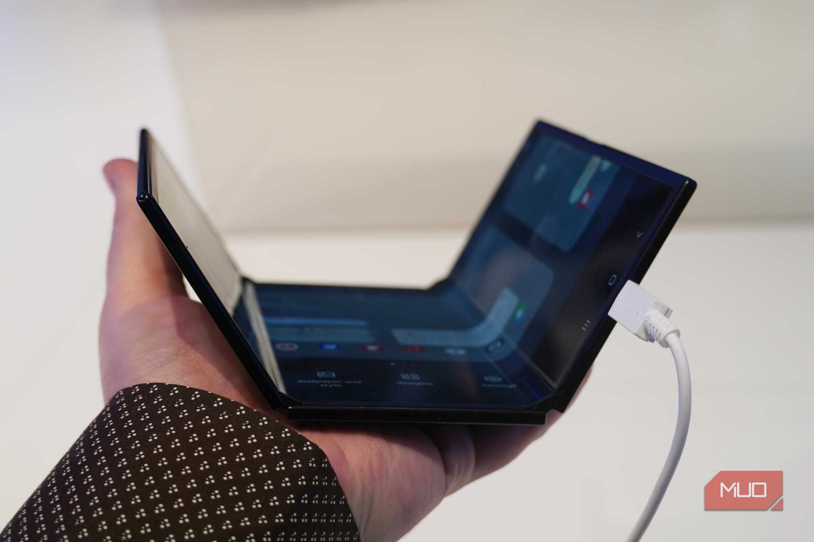 The Galaxy Z TriFold partially unfolded.