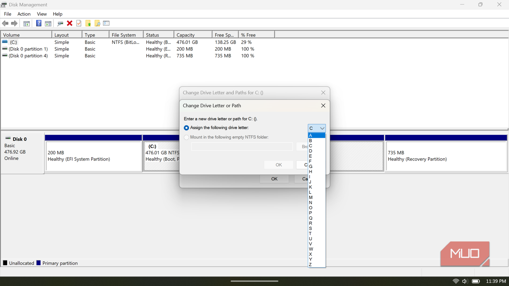 Windows Disk Management tool showing the Change Drive Letter dialog.