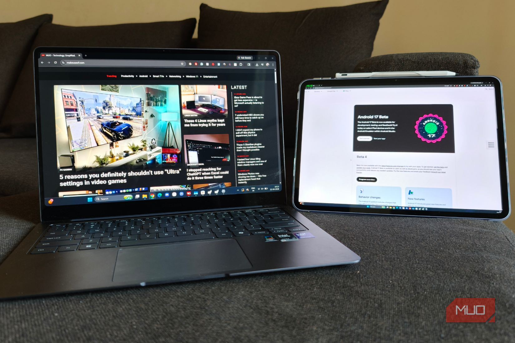 Android 17 beta on tablet and website opened on laptop