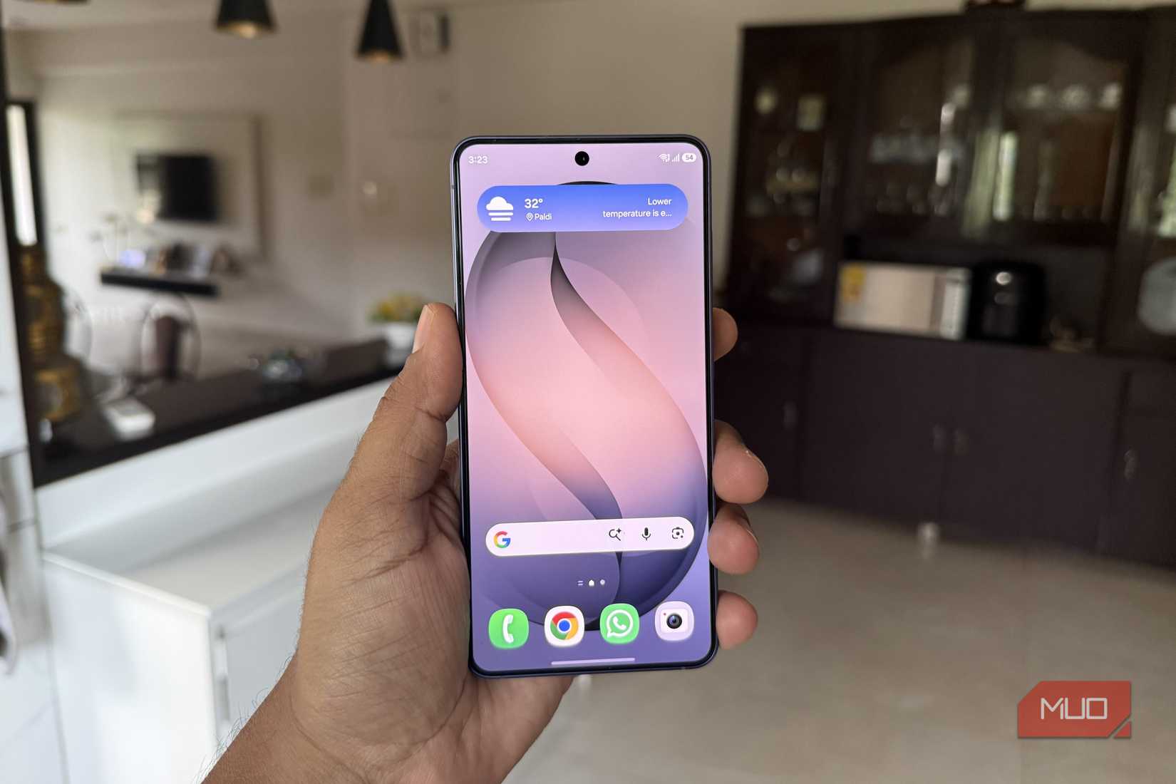 A hand holding Samsung S26
