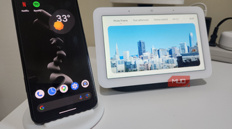 A Google Pixel 5 and a Google Nest Hub.