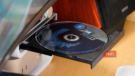 An angled view of a CD inside an optical drive.