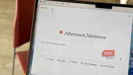 claude ai assistant interface displaying afternoon greeting on mac laptop screen