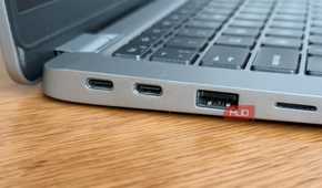 Dell Latitude left side close-up showing two USB-C Thunderbolt ports and USB-A
