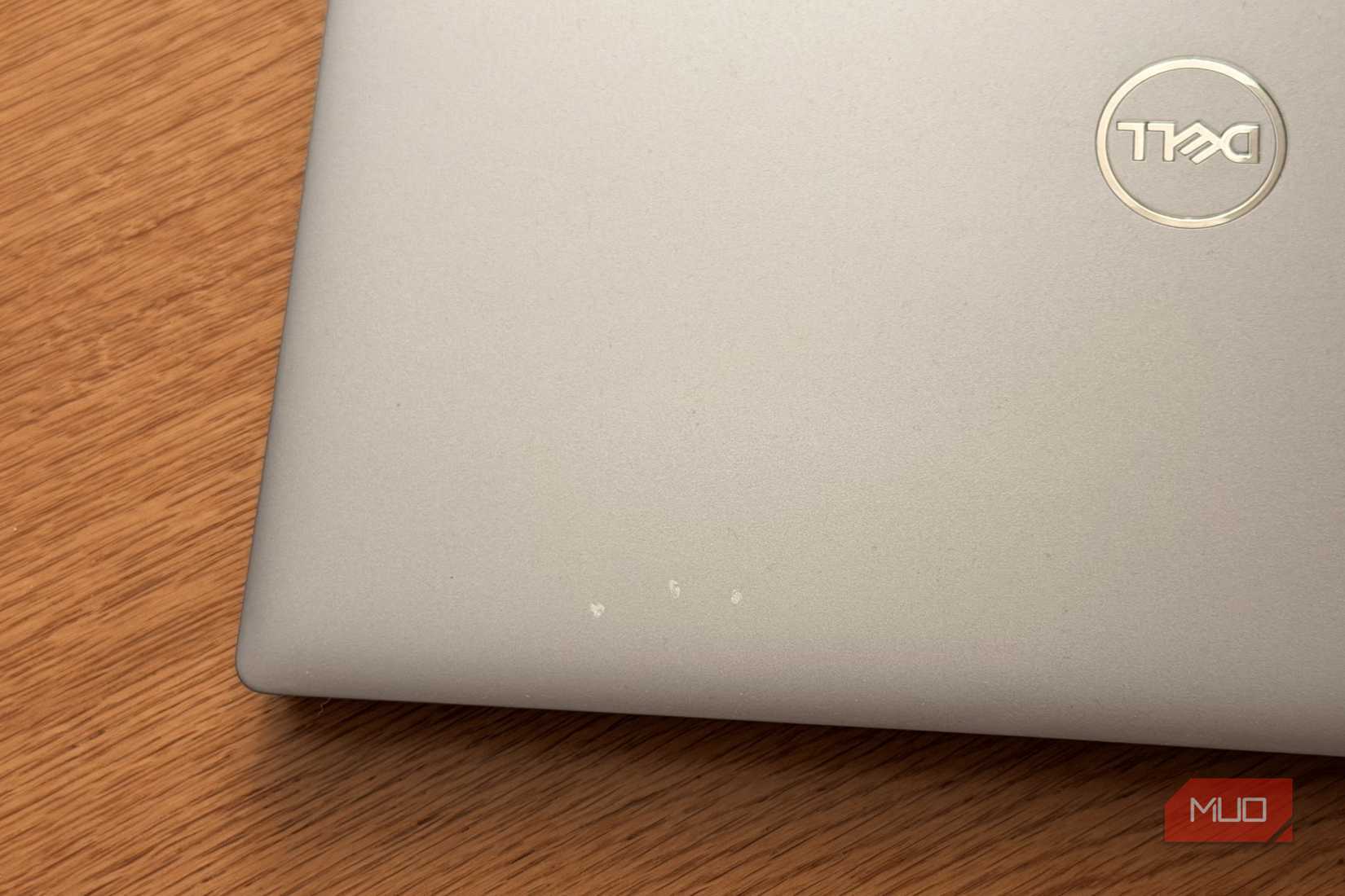 Dell Latitude lid closed showing top corner with Dell logo