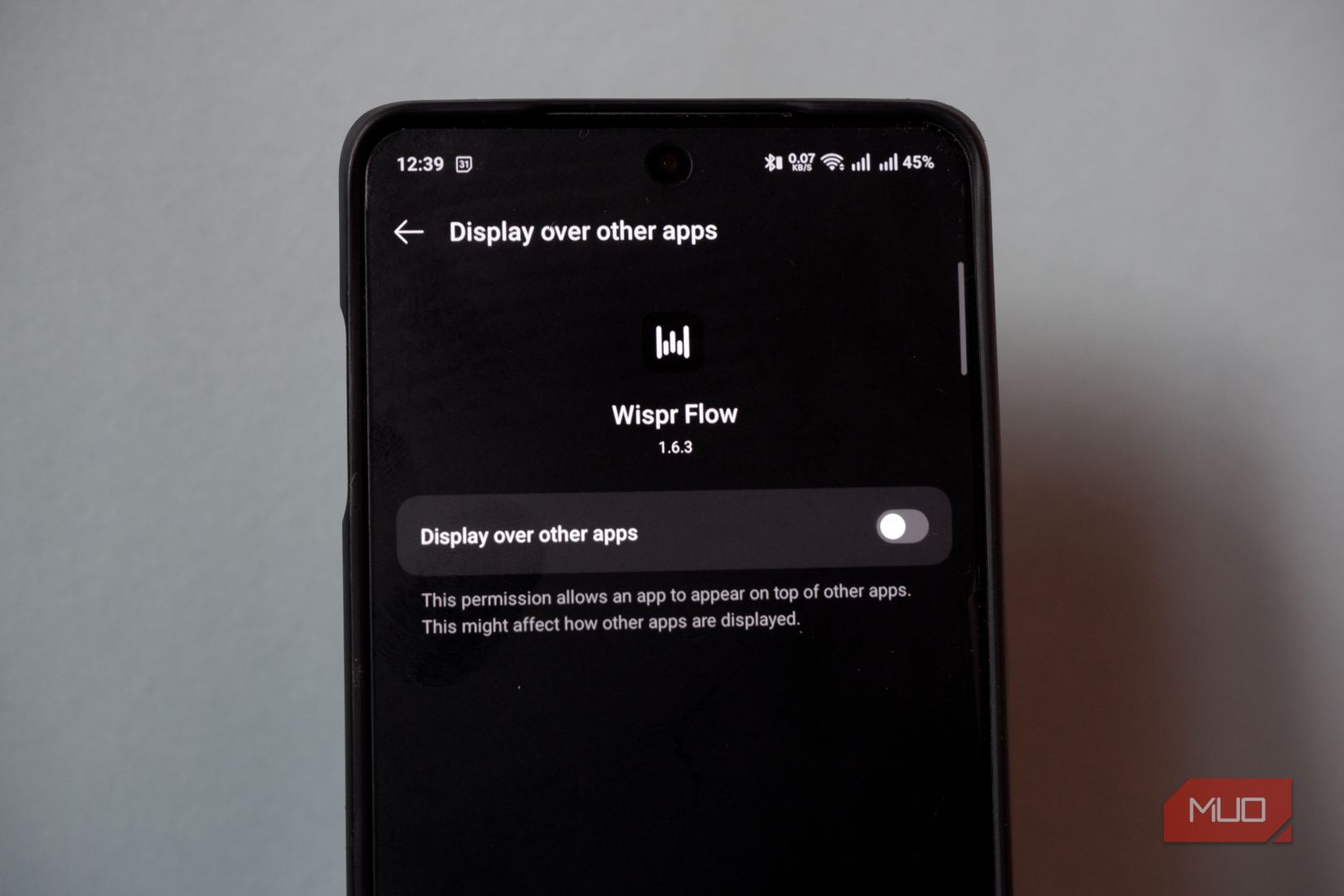 The onboarding interface asking for display over other apps permission