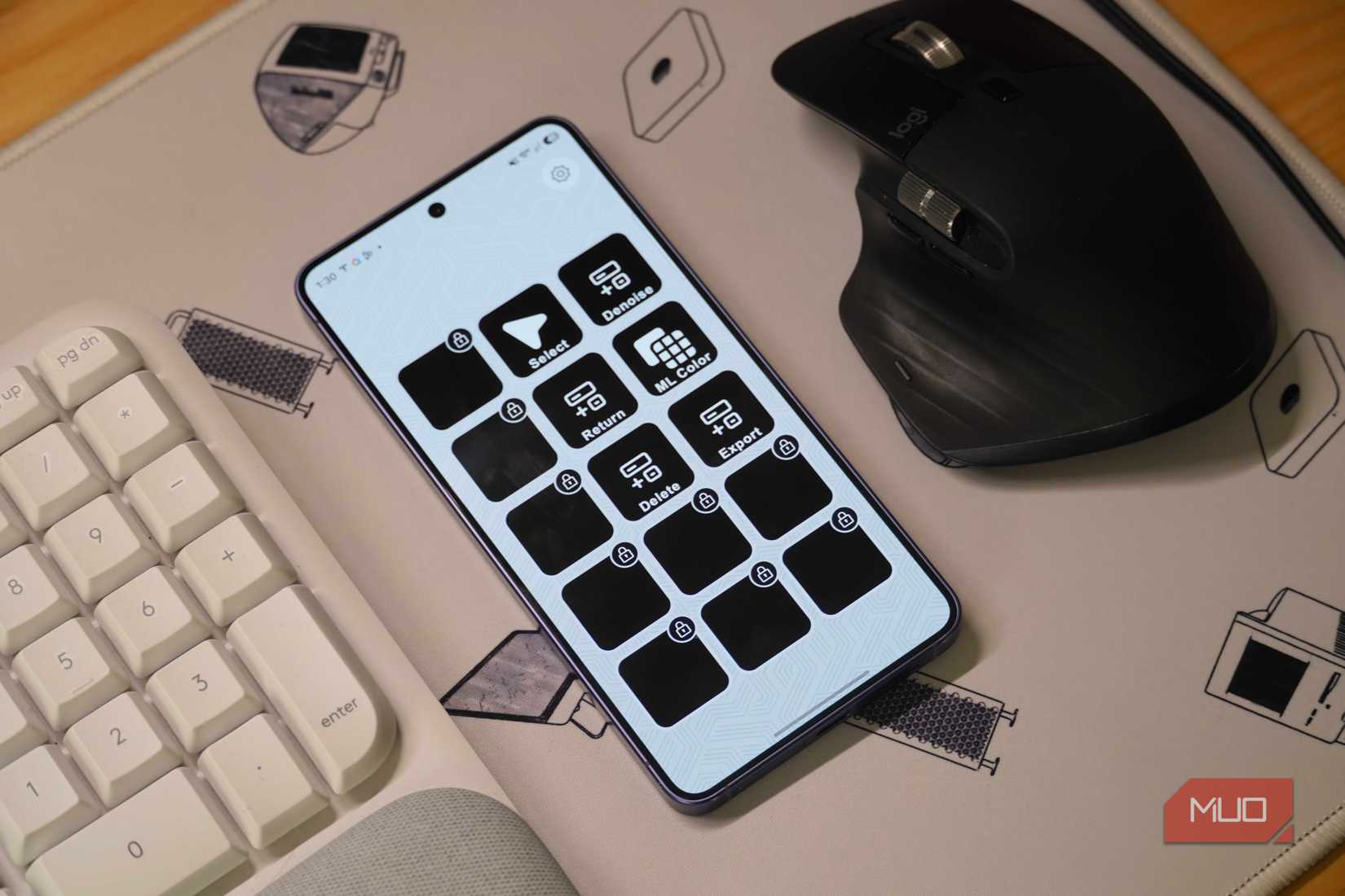 The Stream Deck macros in between a keyboard and mouse on a desk.