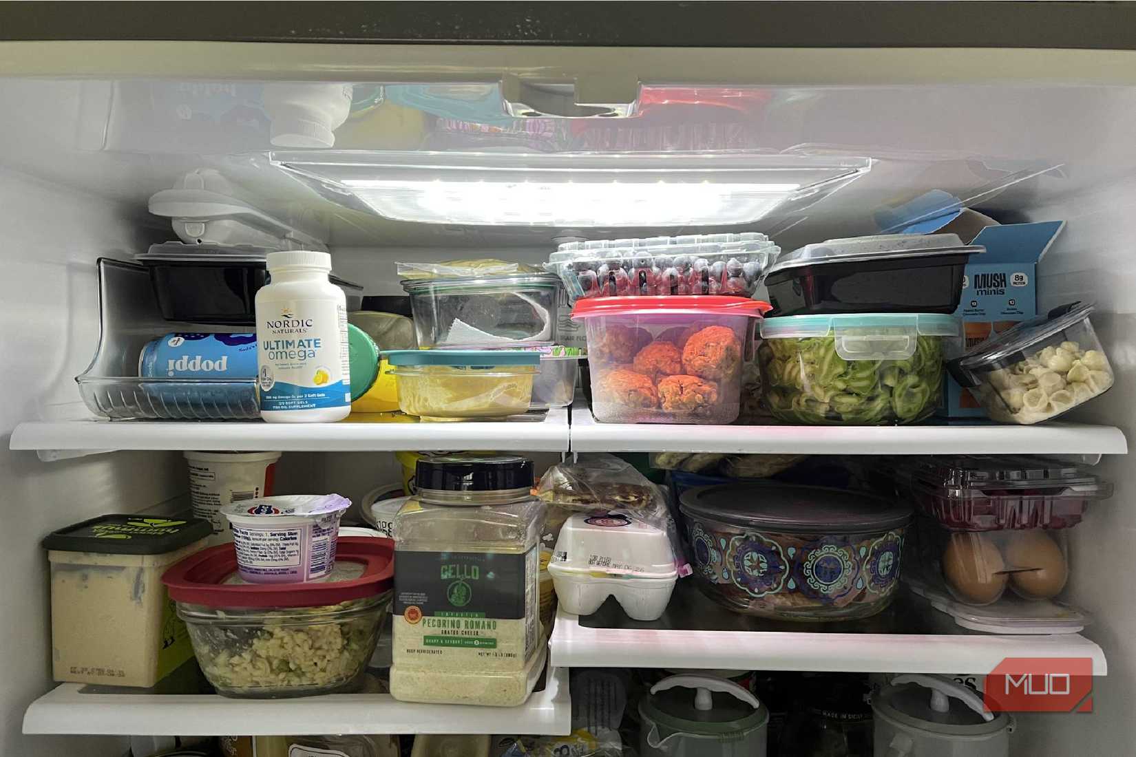 The inside of a refrigerator with looks at the shelves