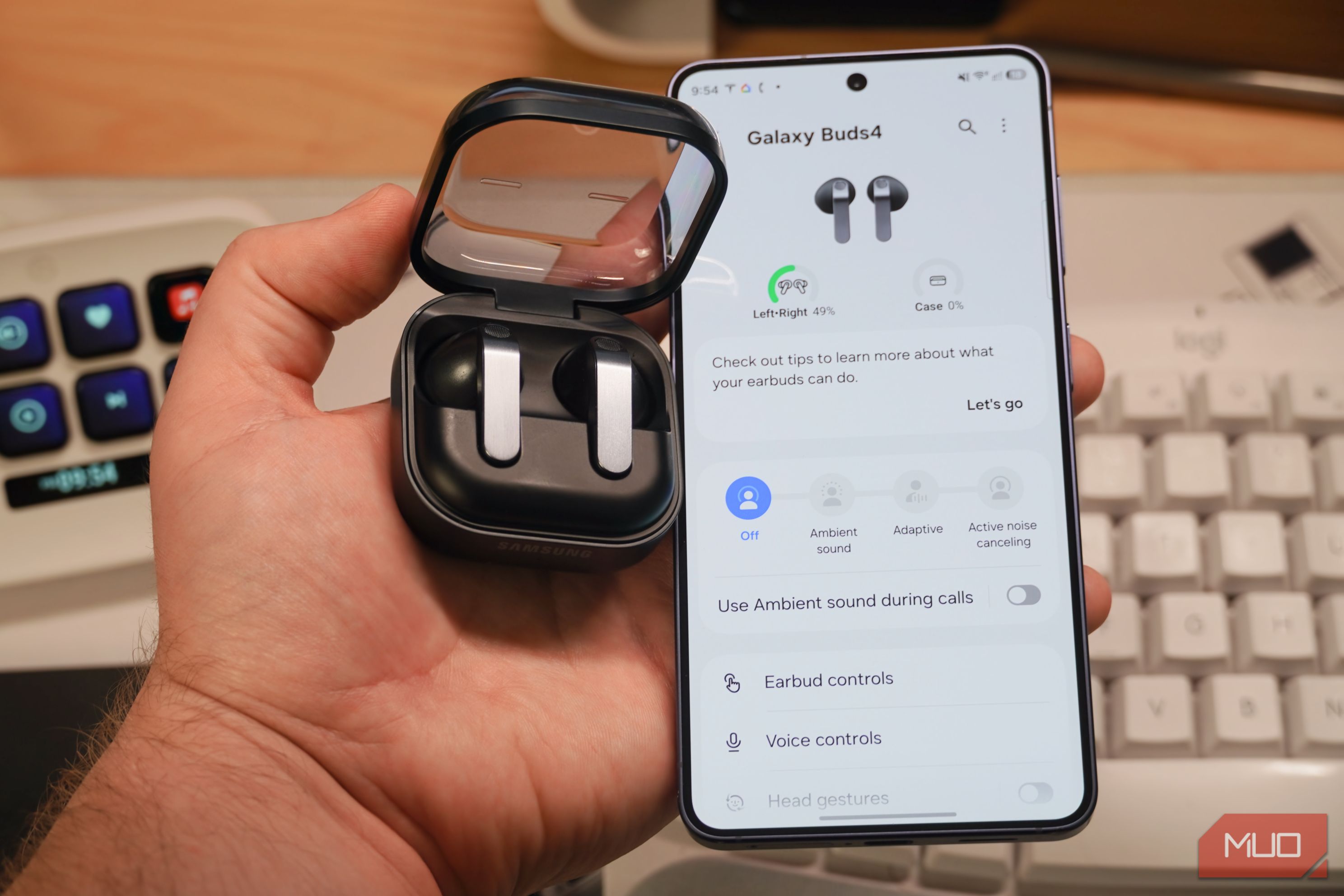 Samsung earbuds beside a Galaxy S26.