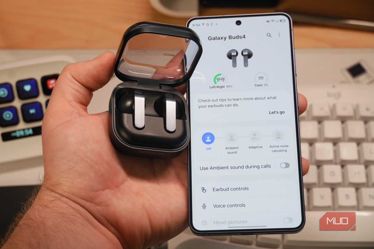Samsung earbuds beside a Galaxy S26.
