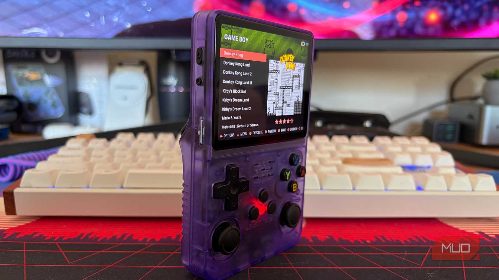 Photo of an R36s retro console showing available Game Boy games